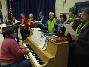 Camden Music School carolers at Loring Elementary.