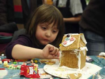 Creating ginger bread houses at Patrick Henry.
