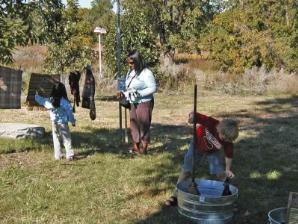 People learn how chores like laundry were done years ago at Heritage Day