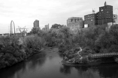 Riverfront property stretching from northernmost Minneapolis to the Stone Arch Bridge will be transformed into a 21st Century public amenity. Photo by Michelle LeGault